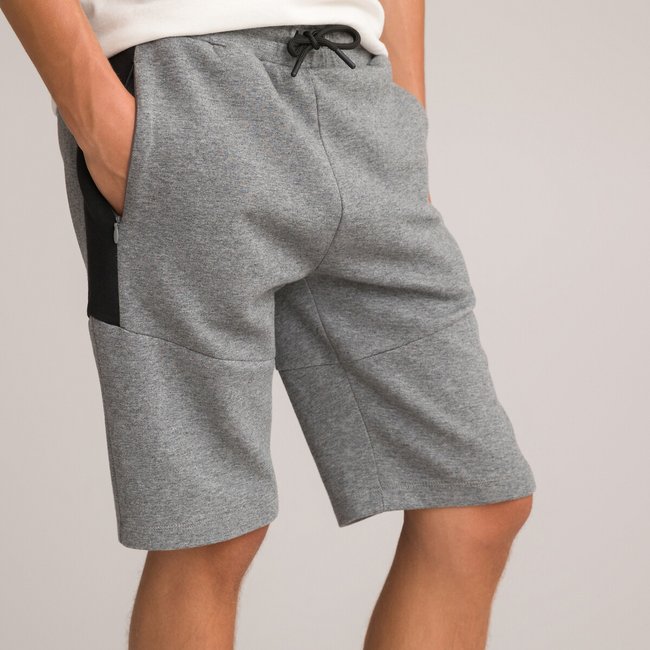 Pantalón corto técnico polar gris jaspeado <span itemprop=