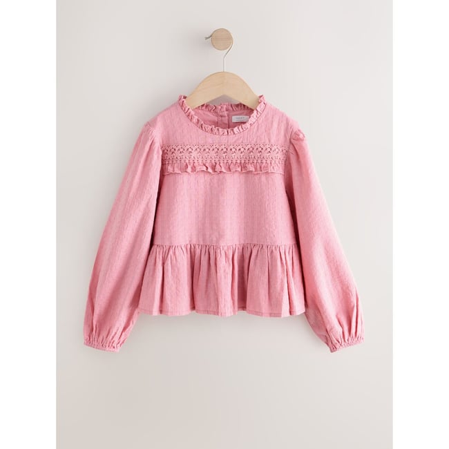 Chemisier à manches longues avec volants rose <span itemprop=