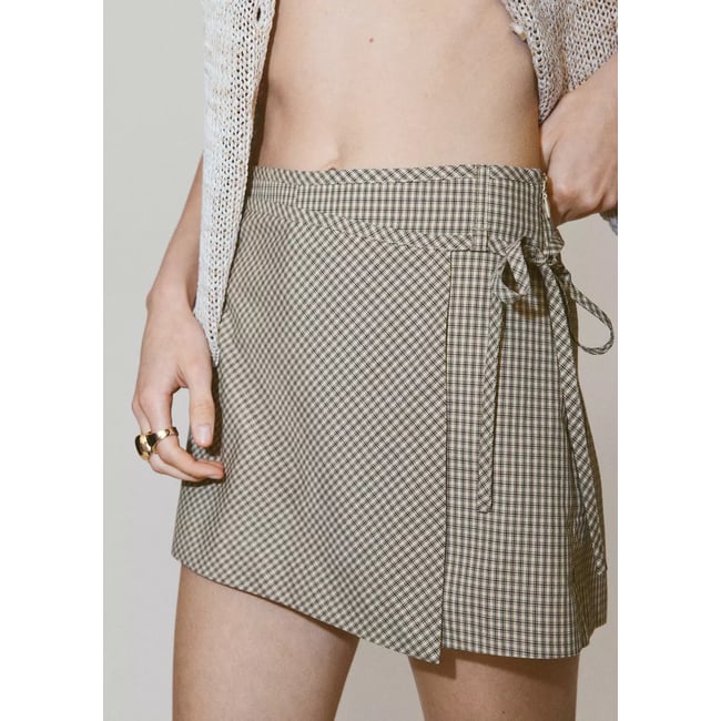 Jupe-short nœud à carreaux écru <span itemprop=