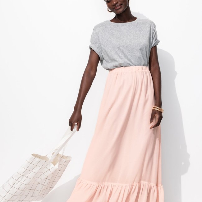 Longue jupe volantée rose pâle <span itemprop=