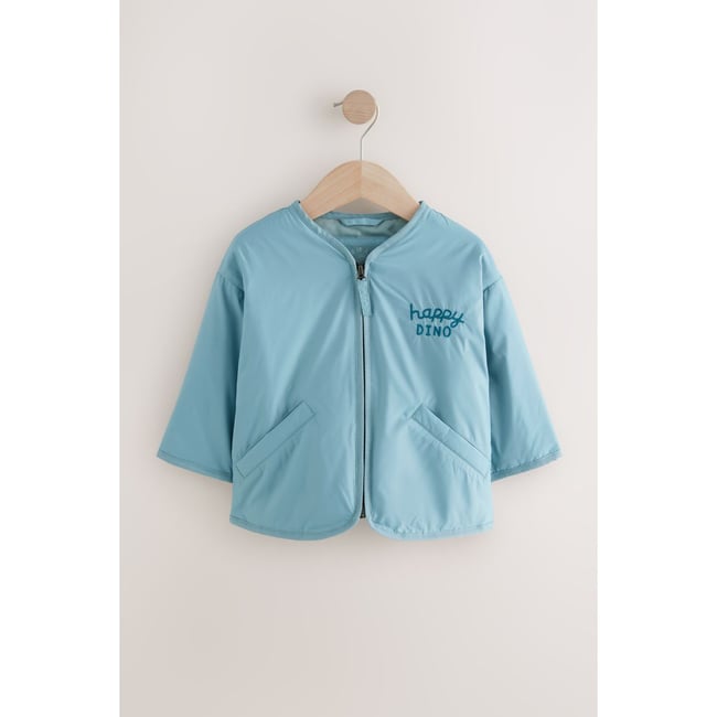 Veste déperlante brodée bleu clair <span itemprop=