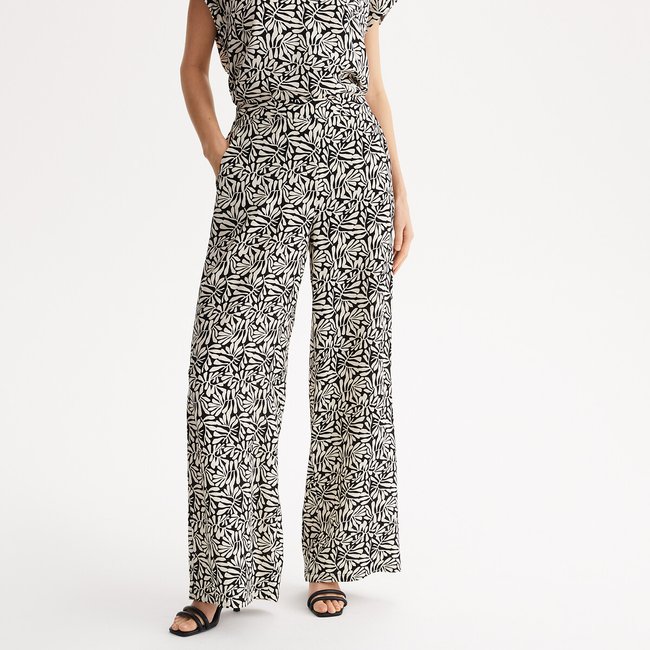 Pantalón ancho de talle alto con estampados florales estampado negro/crudo <span itemprop=