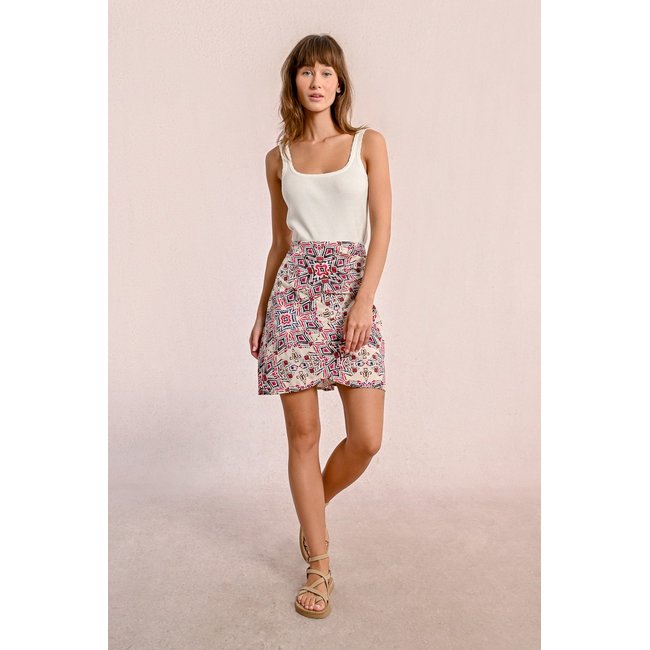 Mini-jupe plissée imprimée crème <span itemprop=