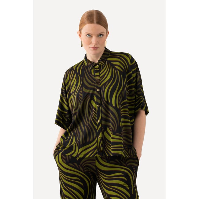 Blouse au tombé fluide noir <span itemprop=