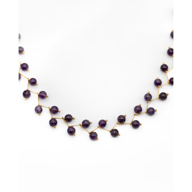 Collier avec des pierres naturelles dorado <span itemprop=