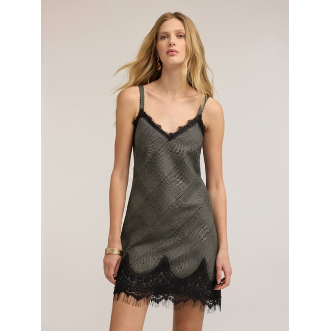 Robe mini à volant noir <span itemprop=