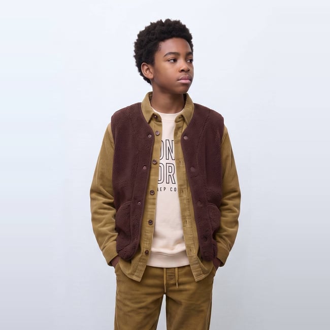 Veste sans manches en jean en coton arbre <span itemprop=