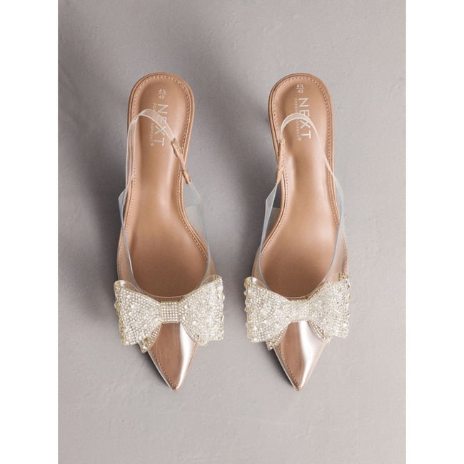 Chaussures à talon, bride arrière et nœud nu/argent <span itemprop=