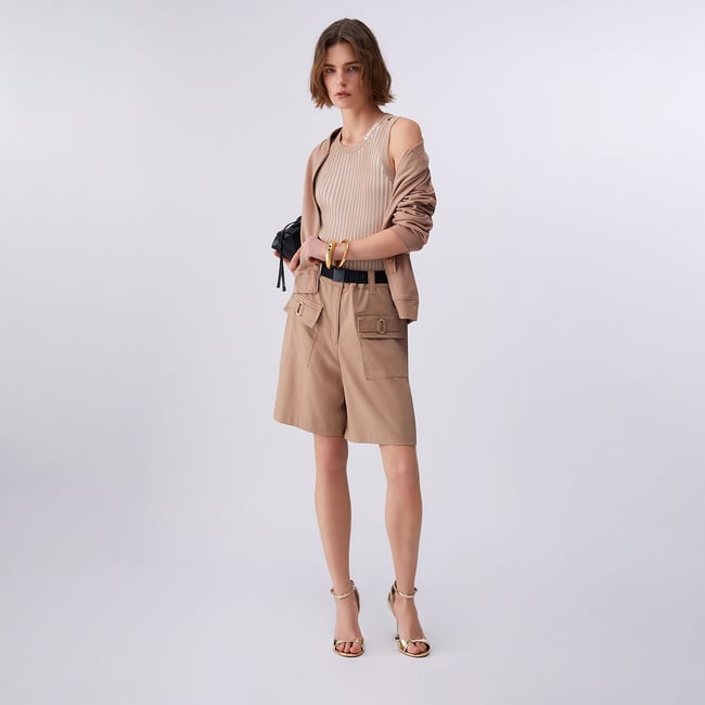 Sweat-shirt avec zip et chaîne beige <span itemprop=