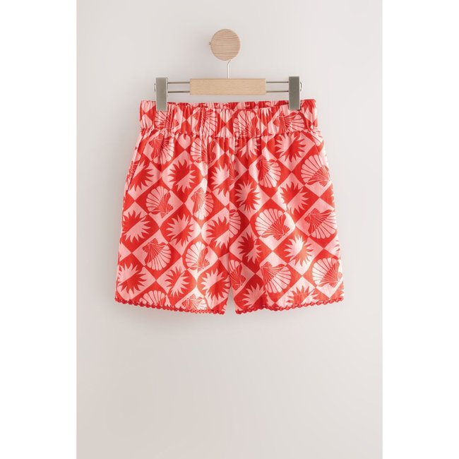 Short d'été contenant du lin rouge/rose <span itemprop=
