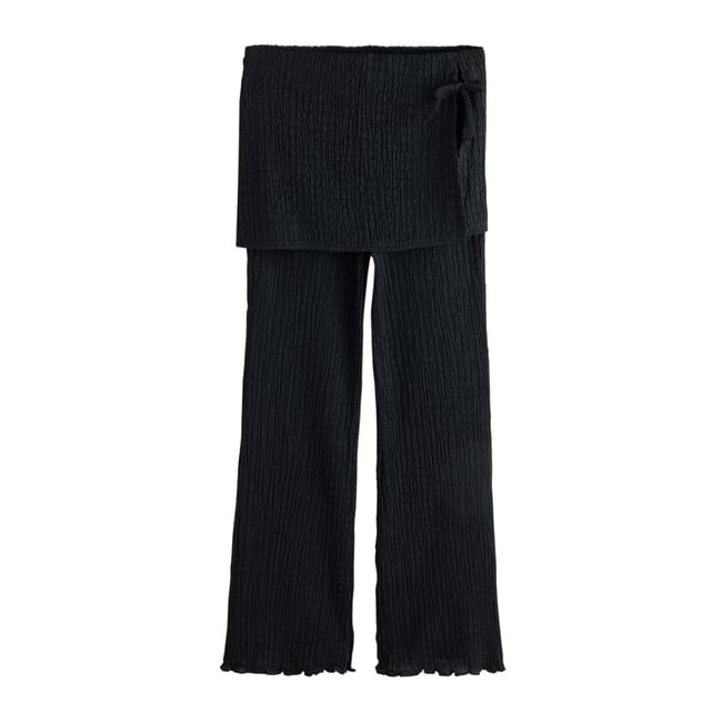 Pantalon évasé avec jupe superposée - NEXT