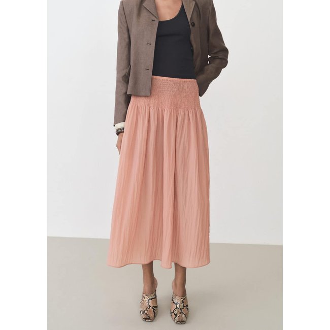 Jupe midi empiècement froncé rose pastel <span itemprop=