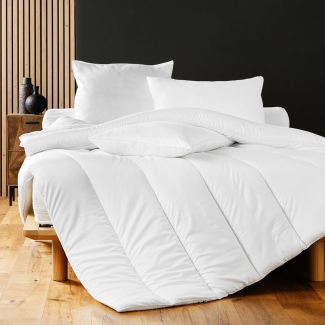 Couette polyester uni confort Couleur blanc <span itemprop=