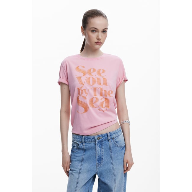 T-shirt rose avec message rouge <span itemprop=