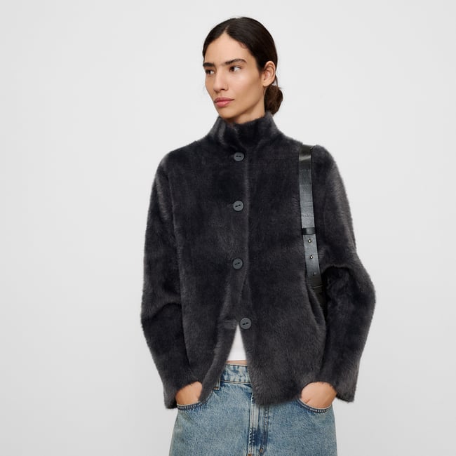 Veste imitation fourrure à col montant gris moyen <span itemprop=