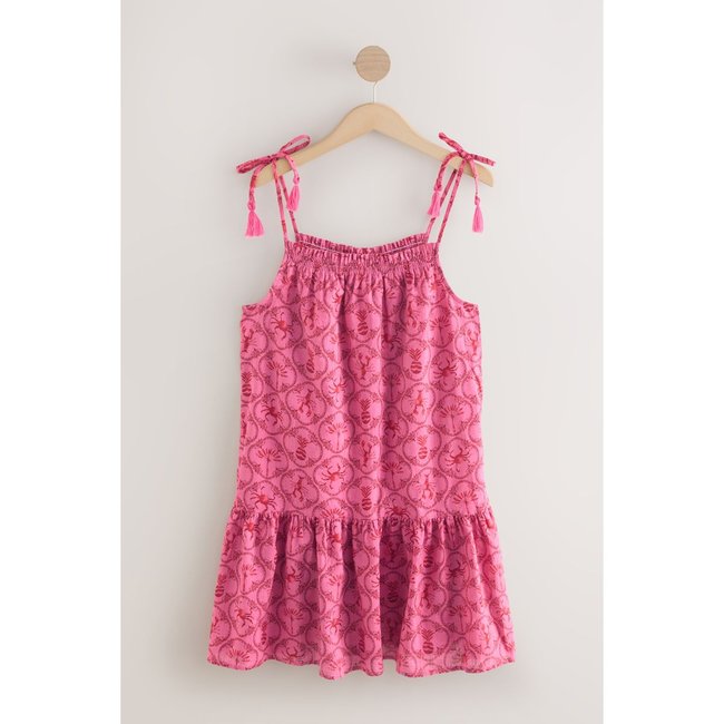 Robe courte à volants et bretelles nouer imprimé crustacés roses <span itemprop=