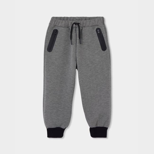 Pantalon garçon en maille avec poches zippées noir <span itemprop=