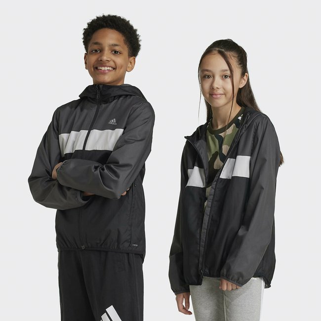 Windjacke mit Kapuze schwarz/grau/weiss <span itemprop=