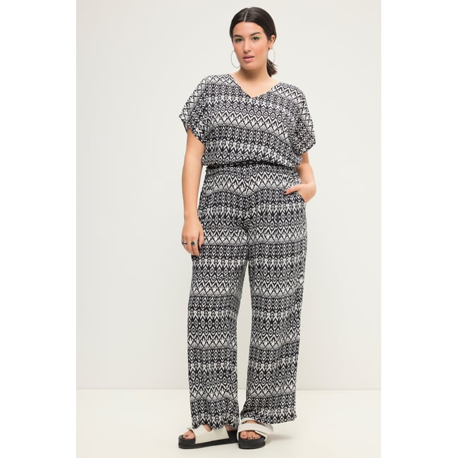 Pantalon taille haute et jambe large. Taille noir <span itemprop=