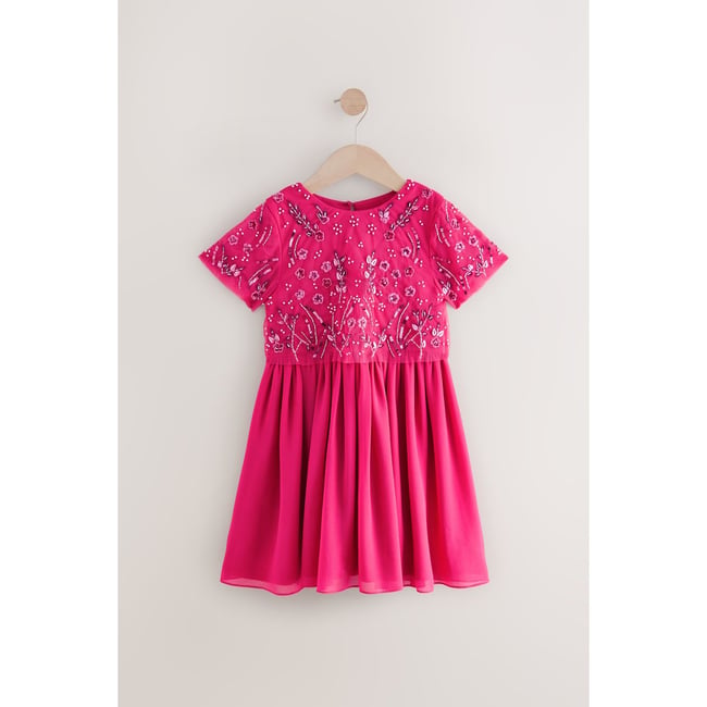 Robe en mesh ornée de sequins rose vif <span itemprop=