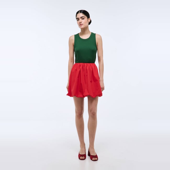 Jupe courte ballon unie contenant du coton lipstick <span itemprop=