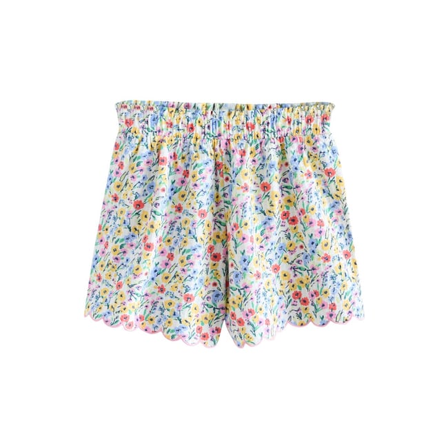 Short texturé à bordure festonnée rose/bleu à motif floral <span itemprop=