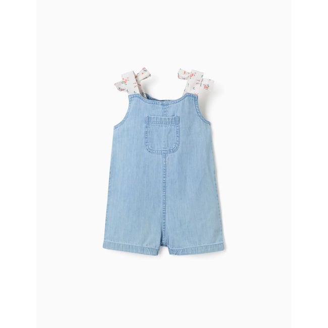 Combishort en jean avec bretelles à motif floral bleu <span itemprop=