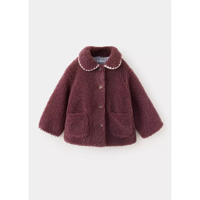 Manteau imitation mouton cerise <span itemprop=