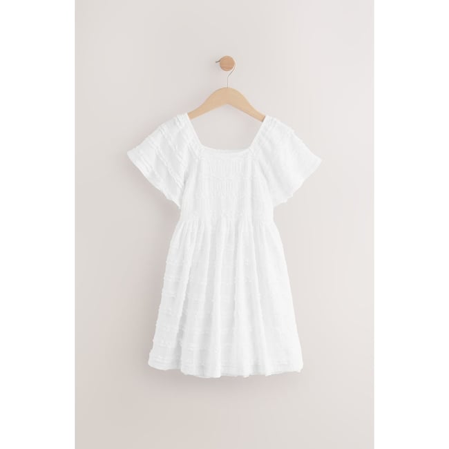 Robe à volants blanc <span itemprop=