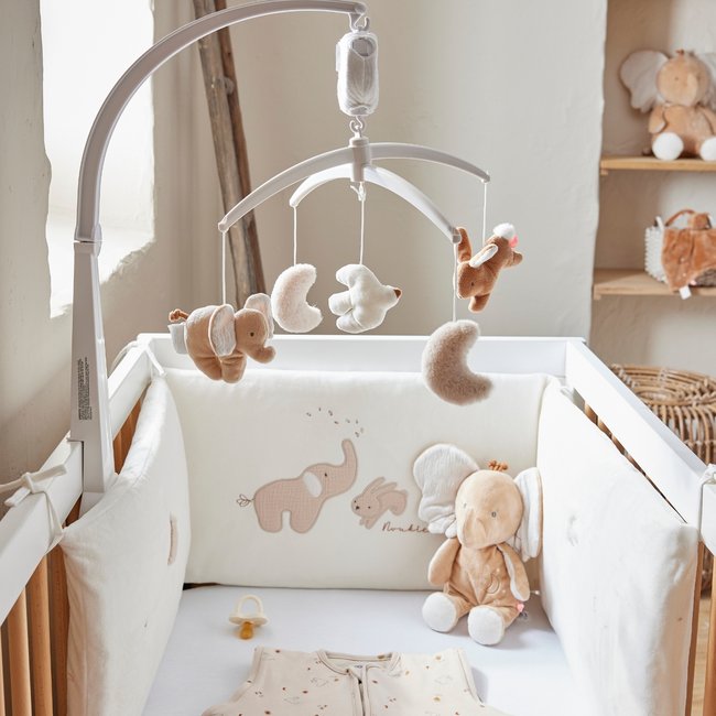 Mobile musical en plastique ecru, blanc, beige <span itemprop=
