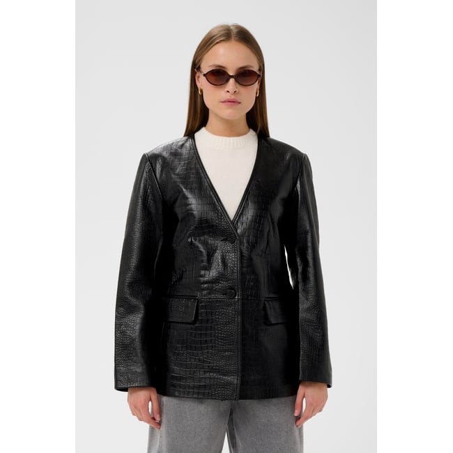 Veste en cuir noir <span itemprop=