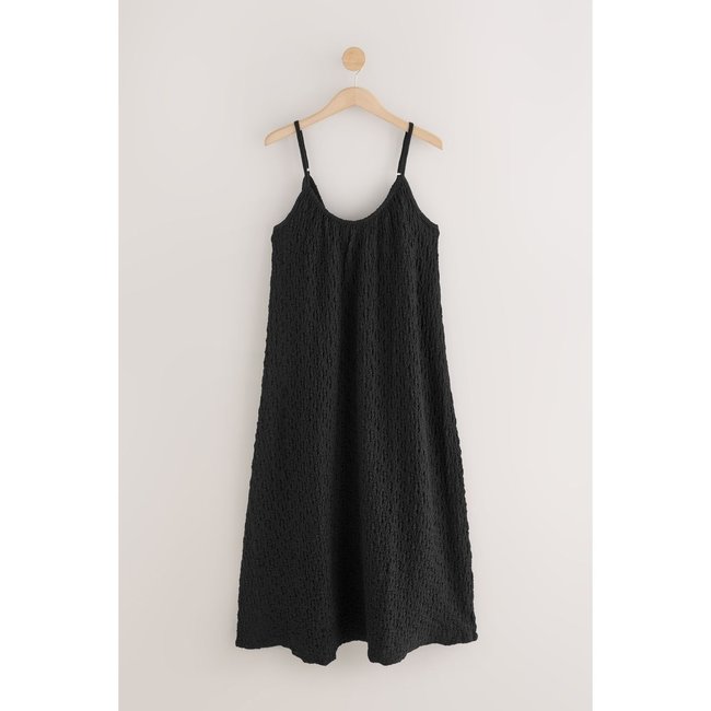 Robe longue texturée en jersey noir <span itemprop=