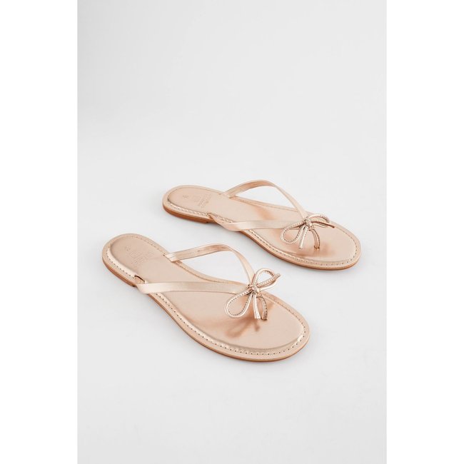 Tongs avec nœud or rose <span itemprop=
