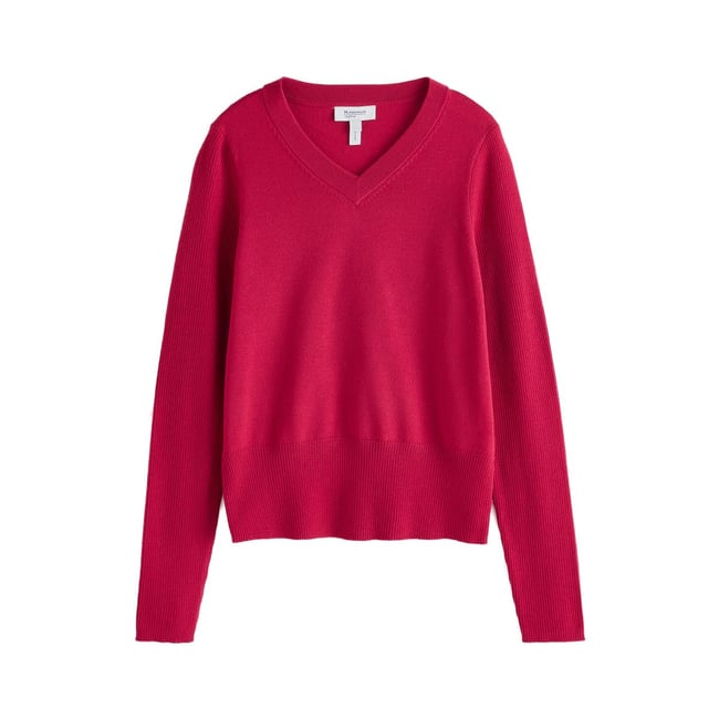 Pull léger en laine mérinos à col v rouge <span itemprop=