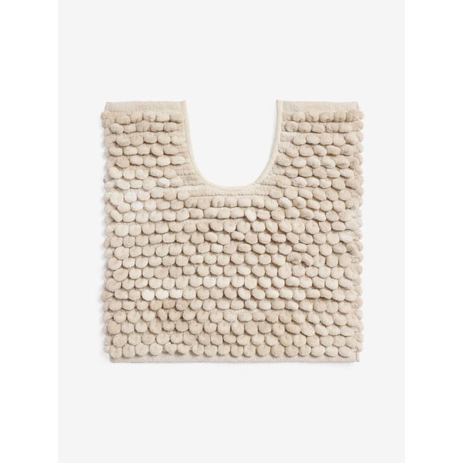 Tapis de bain à pompons naturel <span itemprop=
