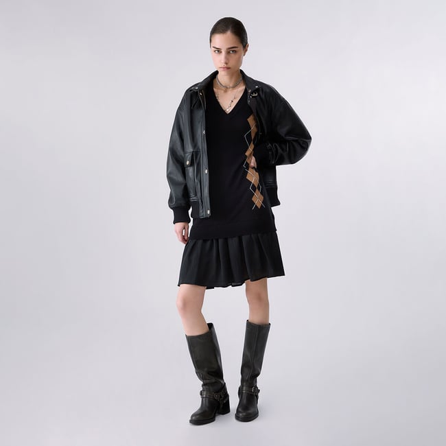 Robe courte en maille noir <span itemprop=