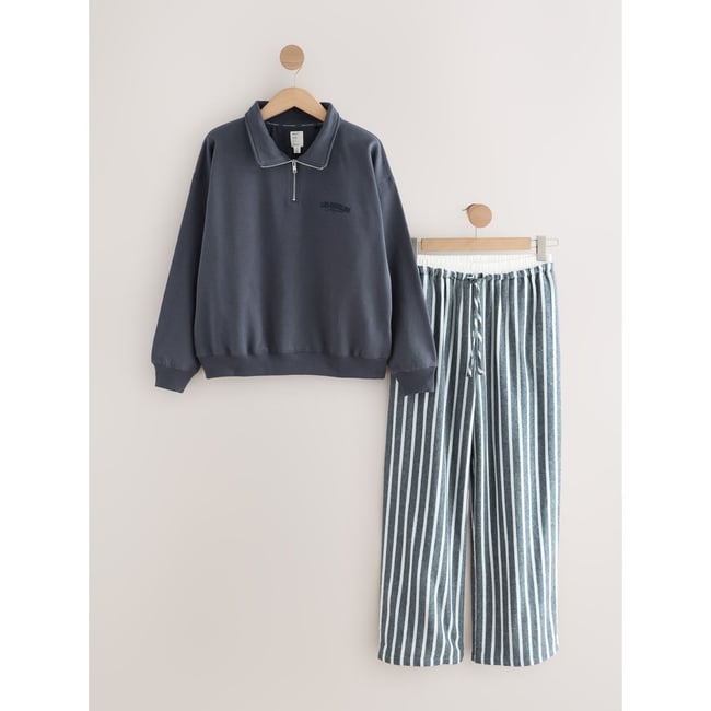 Pyjama en flanelle et sweat semi-zippé bleu marine rayé <span itemprop=