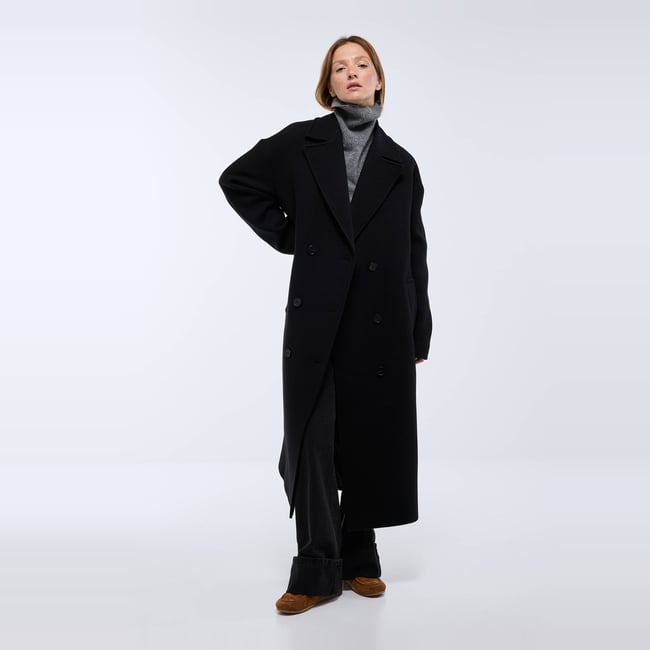 Manteau uni double boutonnage contenant de la laine noir <span itemprop=