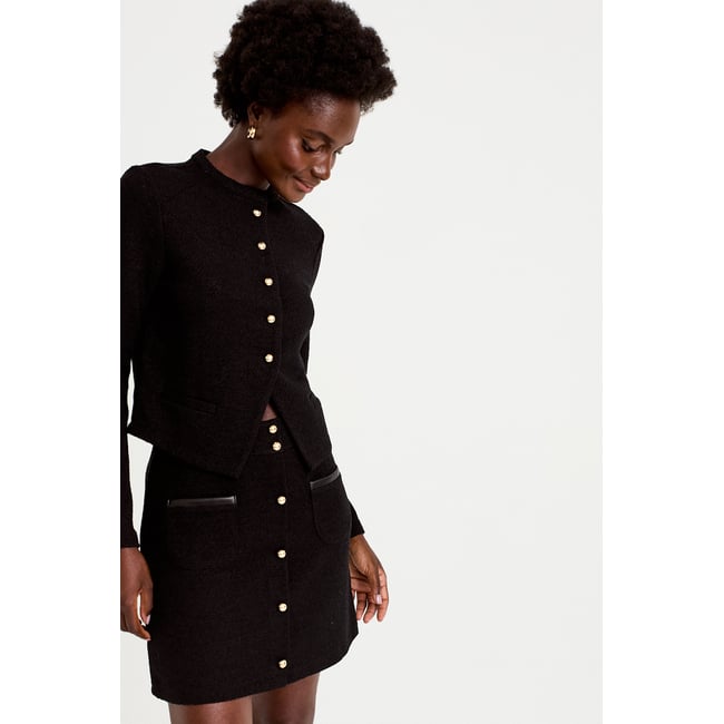 Jupe-short trapèze en maille noir <span itemprop=