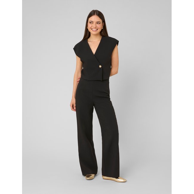 Combinaison sans manches noir <span itemprop=