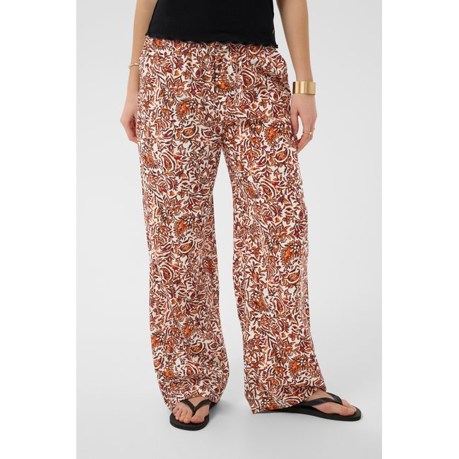 Pantalon casual coupe ample orange saraza flower <span itemprop=