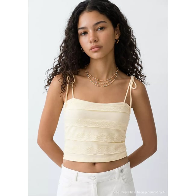 Top maille volants jaune pastel <span itemprop=