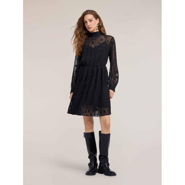 Robe évasée à pois noir <span itemprop=