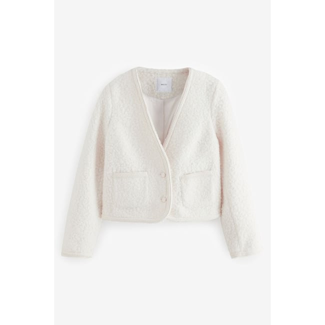 Veste à col v en tissu bouclé écru <span itemprop=