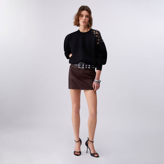 Pull avec broderie de pierres noir <span itemprop=