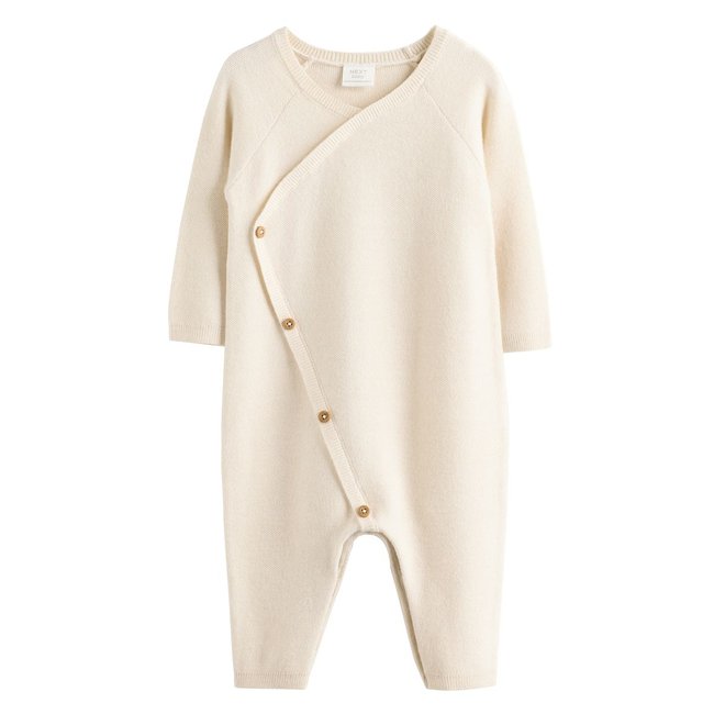 Barboteuse bébé en tricot crème <span itemprop=