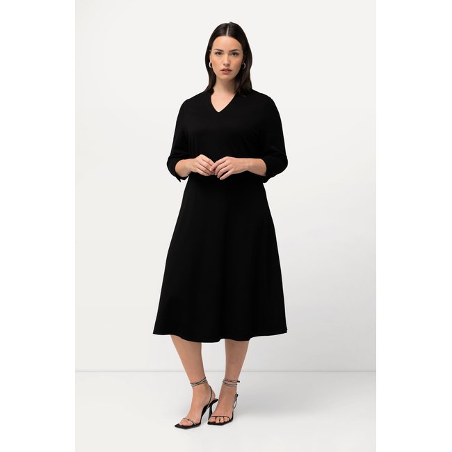 Robe point de Rome, coupe évasée, col V noir <span itemprop=