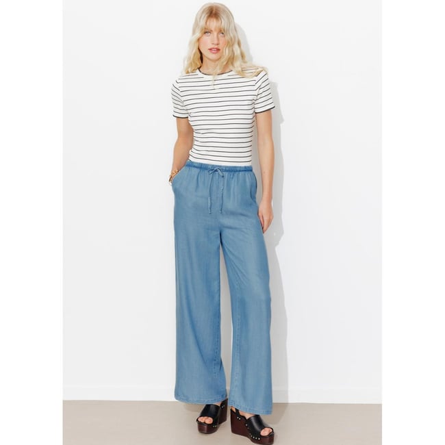 Pantalon large en lyocell jean moyen <span itemprop=
