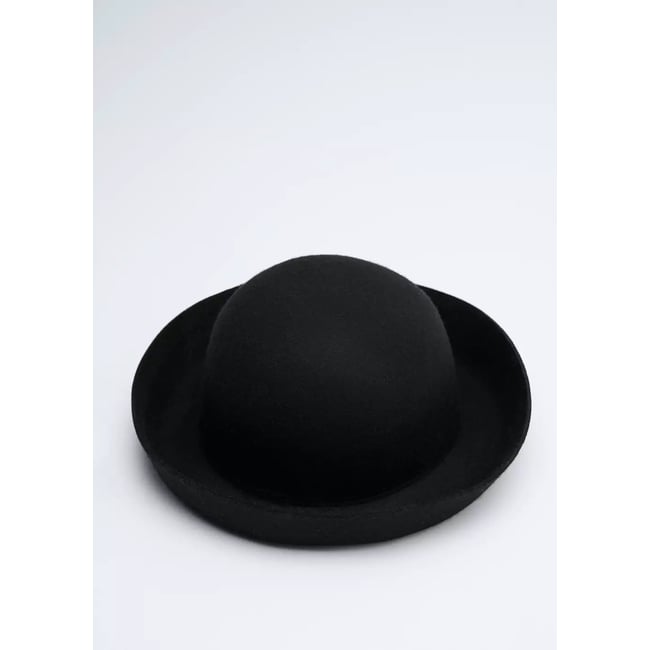 Chapeau 100 % laine à bord relevé noir <span itemprop=