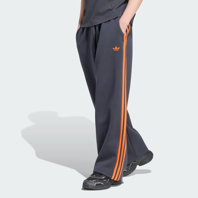 Pantalon De Survêtement Baggy Adicolor night grey <span itemprop=